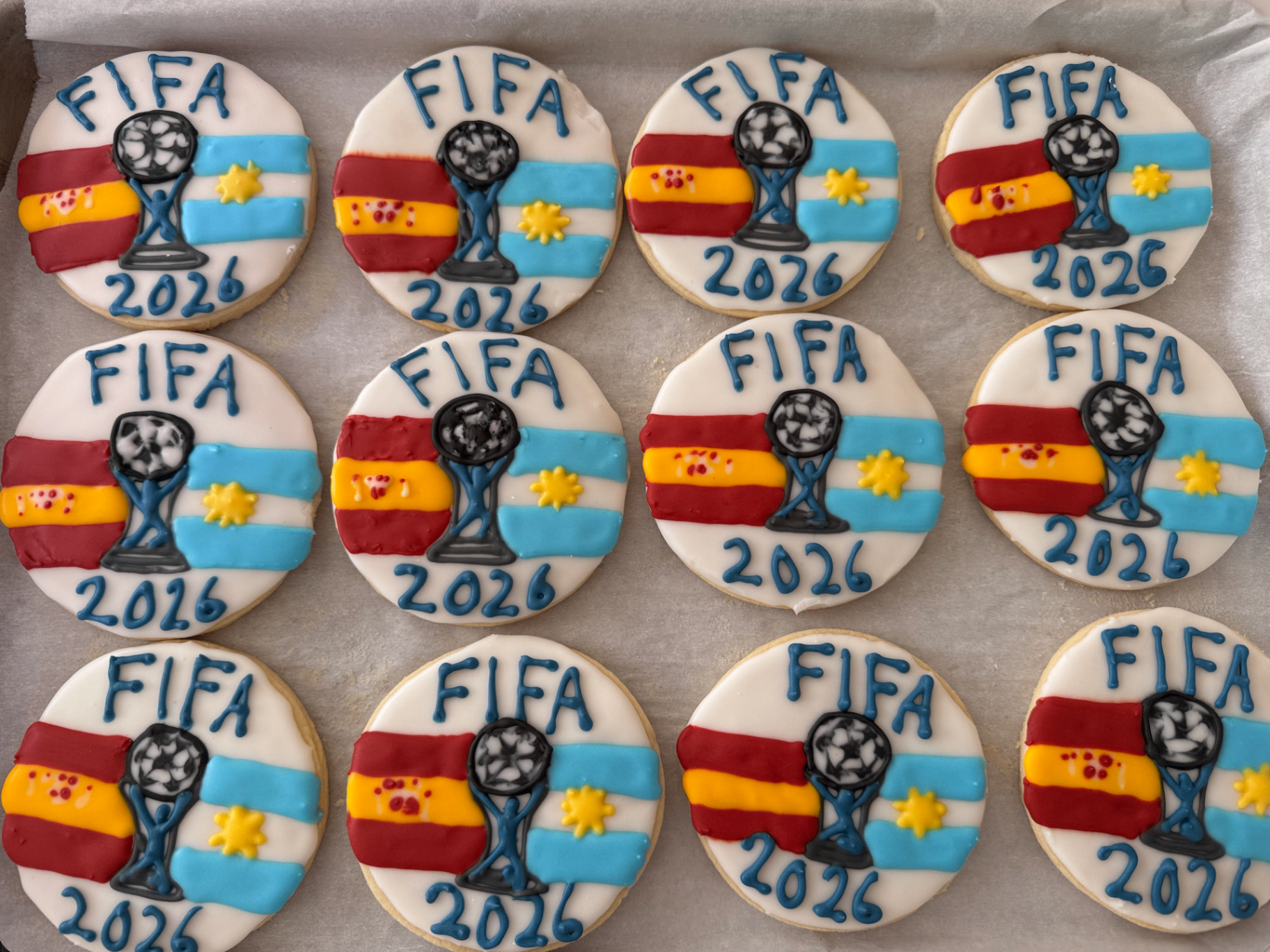 FIFA 2026 World Cup cookies with Spain and Argentina flags and trophy