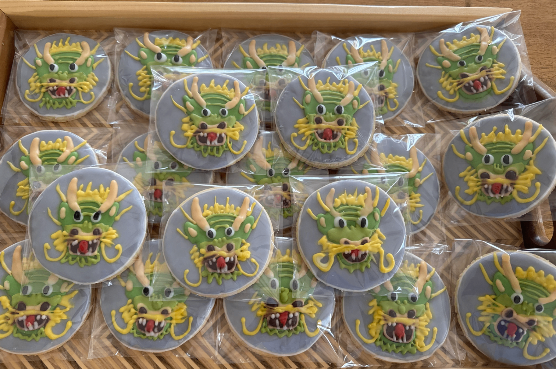 Full tray of Lunar New Year dragon cookies packaged for gifting